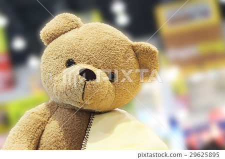 Lovely teddy bear on blurred background Lovely teddy bear on blurred background 29625895