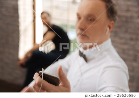 Charming pensioner enjoying music in the dance Charming pensioner enjoying music in the dance 29626686