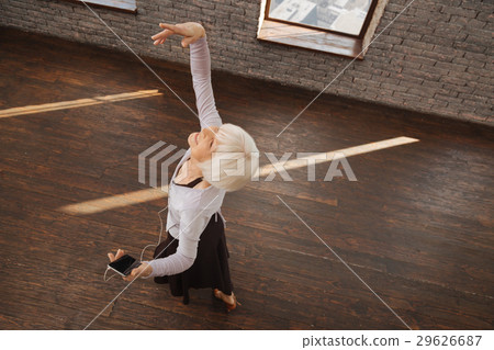 Upbeat retired lady dancing in the ballroom Upbeat retired lady dancing in the ballroom 29626687