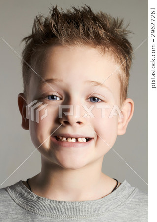 funny face of kid.smiling handsome little boy 29627261