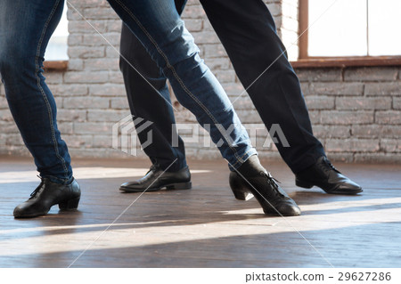 Talented dance couch teaching aging man at the 29627286