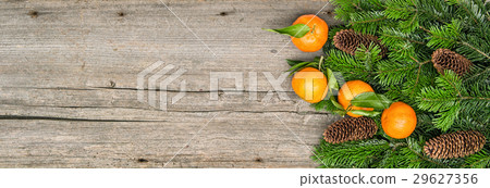 Tangerines and christmas tree branches. Tangerines and christmas tree branches. 29627356