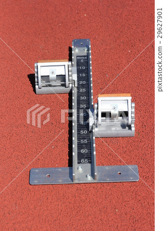 Athletics starting blocks on race red track 29627901