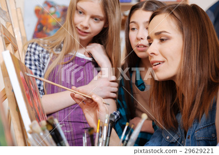 Inspired woman teaching young generation in the 29629221