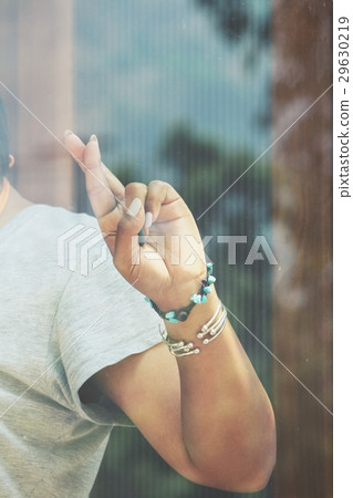 Woman with crossed fingers Woman with crossed fingers 29630219
