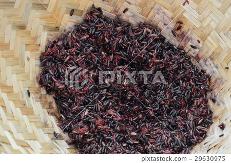 black sticky rice in bamboo earthenware steamer 29630975