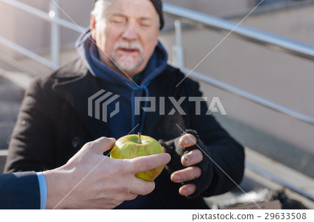 Happy man being glad of apple Happy man being glad of apple 29633508