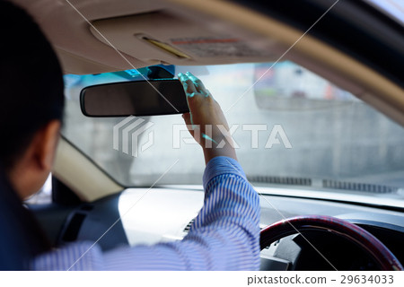 Driver's seat woman driver check mirror casual 29634033