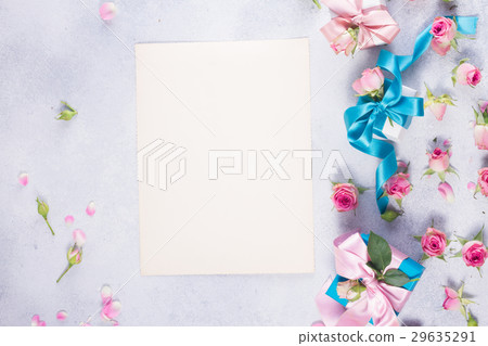 Gift box with satin bow and flowers Gift box with satin bow and flowers 29635291