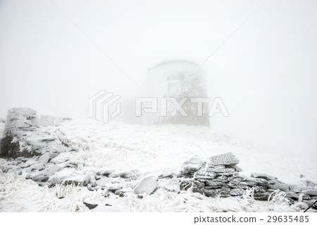 Old castle in snow storm 29635485