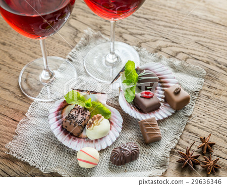 Luxury chocolate candies with two glasses of wine 29636346