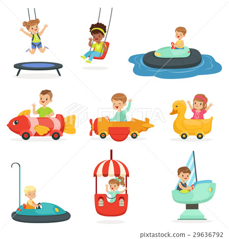 Children ride on attractions in the amusement park 29636792