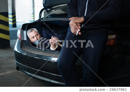 Nice calm man holding his cigarette 29637961