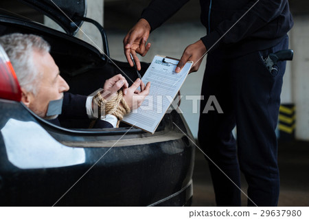Anxious scared man being given a pen 29637980