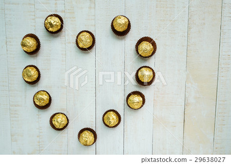 Chocolates arranged in a heart shape Chocolates arranged in a heart shape 29638027