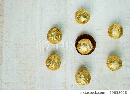 Chocolate ball wrapped in foil Chocolate ball wrapped in foil 29638028