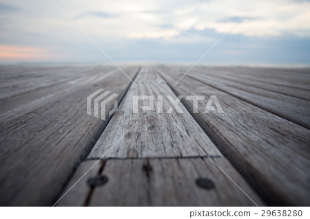 Close up old wooden flooring and tropical beach 29638280
