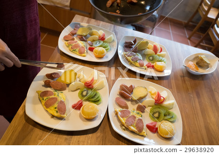 woman prepare breakfast woman prepare breakfast 29638920