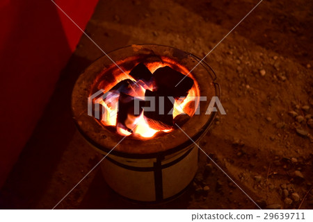 Red and red and charcoal burning in a seven wheel distant view Red and red and charcoal burning in a seven wheel distant view 29639711