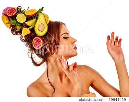 Hair mask from fresh fruits on woman head and 29641439