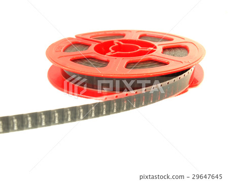 8 mm movie film reel / isolated white 8 mm movie film reel / isolated white 29647645