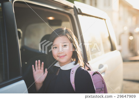 Asian girl in student uniform going to school Asian girl in student uniform going to school 29647909