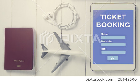 Online Travel booking on Tablet.  29648500