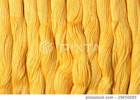 Yellow skeins of floss as background texture Yellow skeins of floss as background texture 29650085