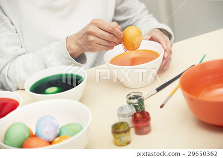 Woman preparing Easter eggs Woman preparing Easter eggs 29650362