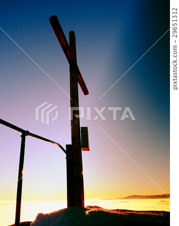 Modest wooden cross on rocky summit. Memory Modest wooden cross on rocky summit. Memory 29651312