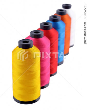 Spools of threads on a white Spools of threads on a white 29652269