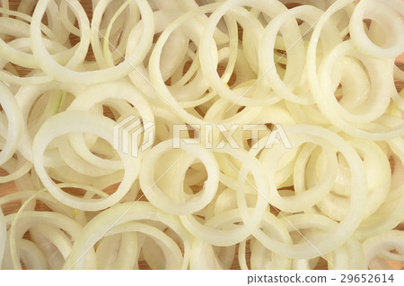 Onion slices background 29652614