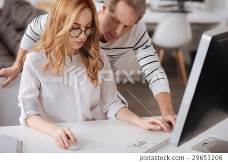 Obsessed mature boss distracting young secretary 29653206