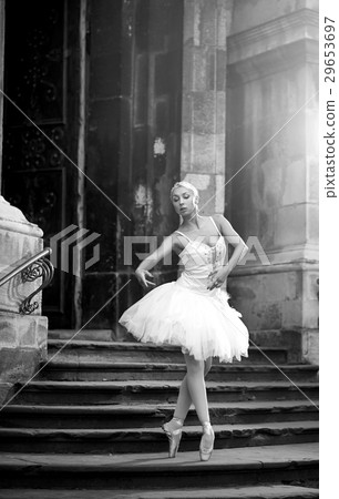 Young ballerina woman posing on stairs Young ballerina woman posing on stairs 29653697