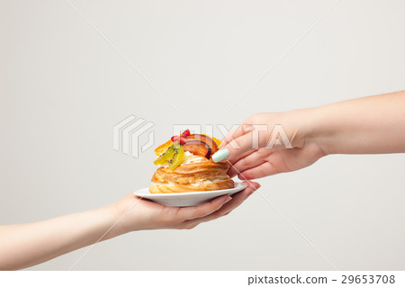 Closeup of cake with fresh fruits on gray 29653708