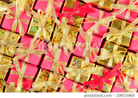Golden and red gifts as background Golden and red gifts as background 29653960