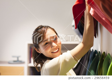 Young lady picking colorful fabric Young lady picking colorful fabric 29656459