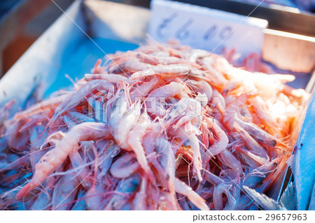 Box full of red shrimp.  Box full of red shrimp.  29657963