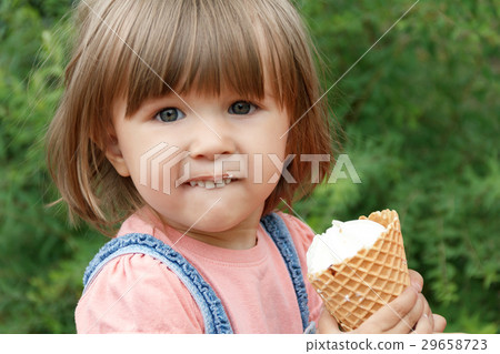 Cute girl are eating icecream Cute girl are eating icecream 29658723