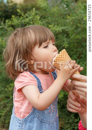 Cute girl are eating icecream Cute girl are eating icecream 29658725
