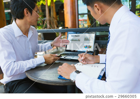 Two businessmen talking about sales. 29660305