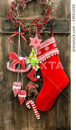 Christmas stocking and handmade toys hanging. 29661088