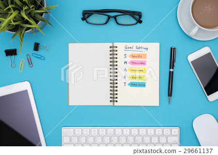Smart goal setting with office supplies over desk 29661137