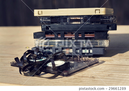 Old broken unwound compact cassette audio tape Old broken unwound compact cassette audio tape 29661289
