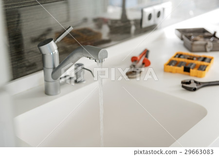 Working appliance in light kitchen Working appliance in light kitchen 29663083