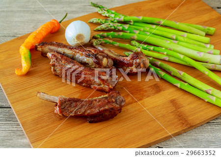 Delicious BBQ ribs with toasted bread BBQ sauce 29663352