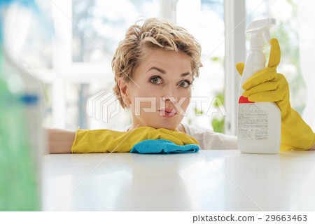 Interested female person keeping detersive Interested female person keeping detersive 29663463