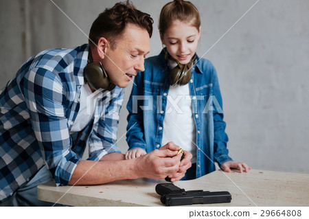 Nice positive man teaching his daughter 29664808