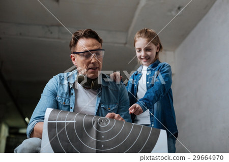 Happy cheerful girl looking at the target Happy cheerful girl looking at the target 29664970