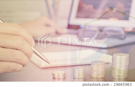 Business man is analyzing the stock market online 29665963